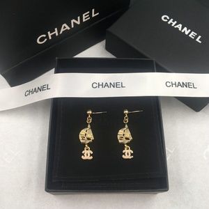 Golden sail earrings